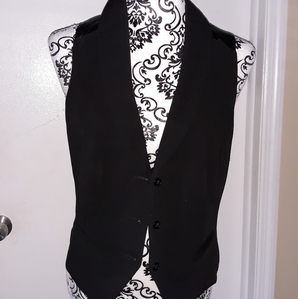 2 x $ 20 Simply chic Vest
